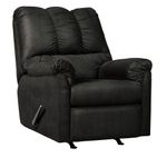 Full shot of a black recliner chair.    The chair has a dark, possibly black, fabric upholstery.  The back and cushions have a textured, slightly tufted appearance.    The armrests are well-padded and upholstered in the same material as the rest of the chair.    The chair has a rocking/gliding base.    Reclining mechanisms are visible, and the chair likely reclines and/or rocks.    The chair is presented against a plain white background, which allows the chair's color and design to stand out.