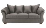 A three-seat couch, presented in a muted gray or taupe color.  The upholstery appears to be a smooth, possibly fabric-like material.  The couch has gently curved armrests and a slightly raised back, creating a comfortable and visually appealing profile.  The cushions are plump and appear to be well-filled.  The couch's legs are a dark, likely brown or espresso, wood tone. The couch is presented against a plain white background, focusing solely on the furniture piece.
