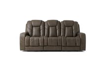 Full frontal view of a dark-gray, leather, power-reclining sofa. The sofa is a three-seater with two reclining sections. The sculpted armrests and back are prominent features, contributing to a contemporary design aesthetic. The background is pure white, making the sofa the sole focus of the image.