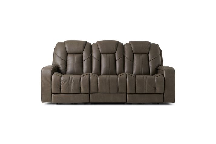 Full frontal view of a dark-gray, leather, power-reclining sofa. The sofa is a three-seater with two reclining sections. The sculpted armrests and back are prominent features, contributing to a contemporary design aesthetic. The background is pure white, making the sofa the sole focus of the image.