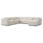 A light beige or cream-colored sectional sofa with a chaise lounge.   The sectional is an L-shape with multiple seating areas. The sofa has a modern design with clean lines, and the seating areas are padded, with visible cushioning. Each end of the sectional has armrests.   The sofa is presented against a plain white background, which allows the light beige color of the sofa to stand out clearly.