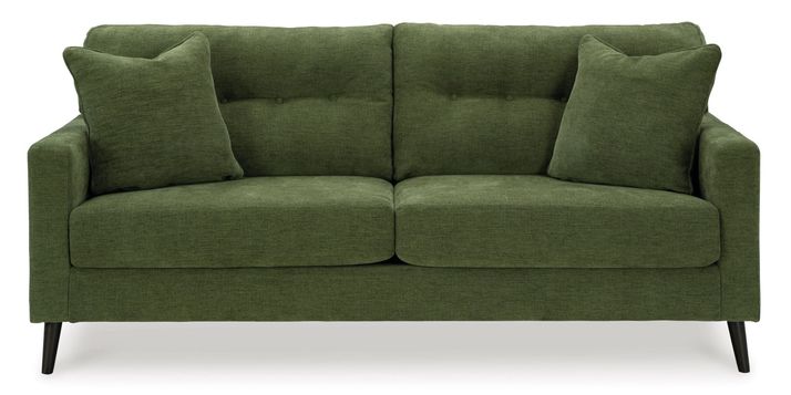 A dark olive green sofa is centrally positioned against a plain white background.   The sofa has a classic, padded, button-tufted back, and the upholstery has a subtle, textured weave. Two matching armrests are visible on each side. The sofa's legs are a dark brown or black wood tone. Two square accent pillows are placed on the back of the sofa. The couch appears to be modern and well-made.
