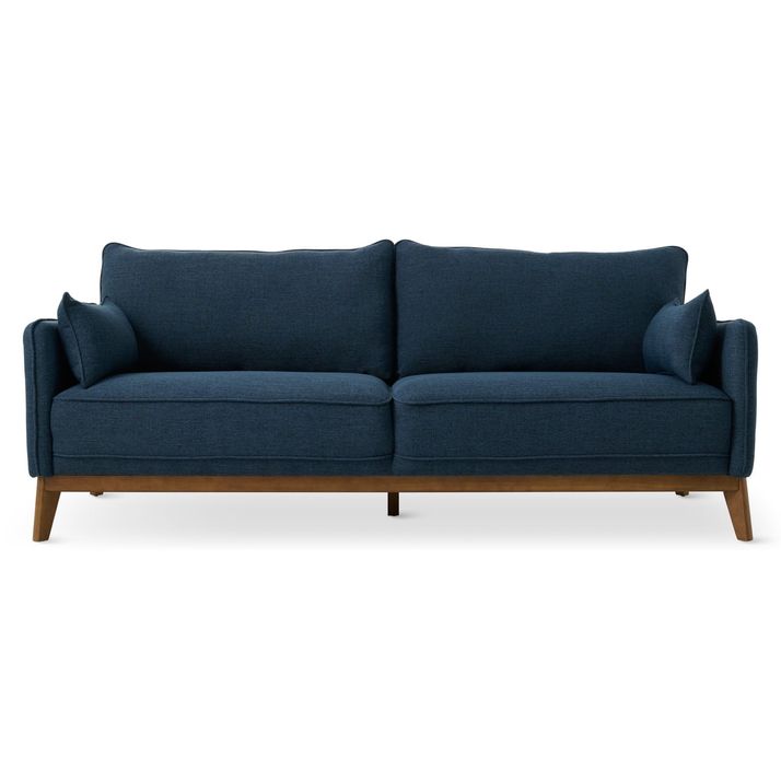 A navy blue sofa with light brown wooden legs.  The sofa is a standard three-seater design with a slightly curved backrest and armrests.  The fabric appears to be a smooth, upholstery-grade material. The sofa is presented against a plain white background, allowing for a clear view of its form and color.