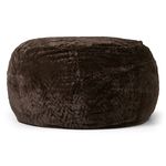 A large, round, plush pouf filled with gel memory foam, upholstered in luxurious crushed velvet fabric in a rich, dark brown color with subtle lighter highlights that create a textured, marbled appearance. The pouf has a soft, cushioned form with visible stitching along the top and sides, giving it a slightly segmented look. It sits against a plain white background, emphasizing its cozy and inviting design.