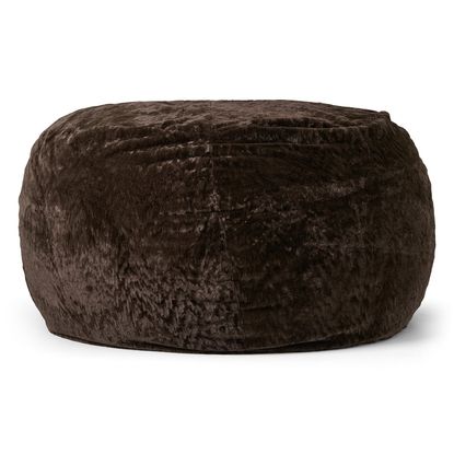 A large, round, plush pouf filled with gel memory foam, upholstered in luxurious crushed velvet fabric in a rich, dark brown color with subtle lighter highlights that create a textured, marbled appearance. The pouf has a soft, cushioned form with visible stitching along the top and sides, giving it a slightly segmented look. It sits against a plain white background, emphasizing its cozy and inviting design.