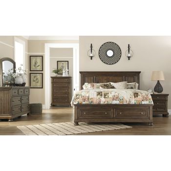 A picture of Flynnter Queen Panel Storage Bedroom Set.