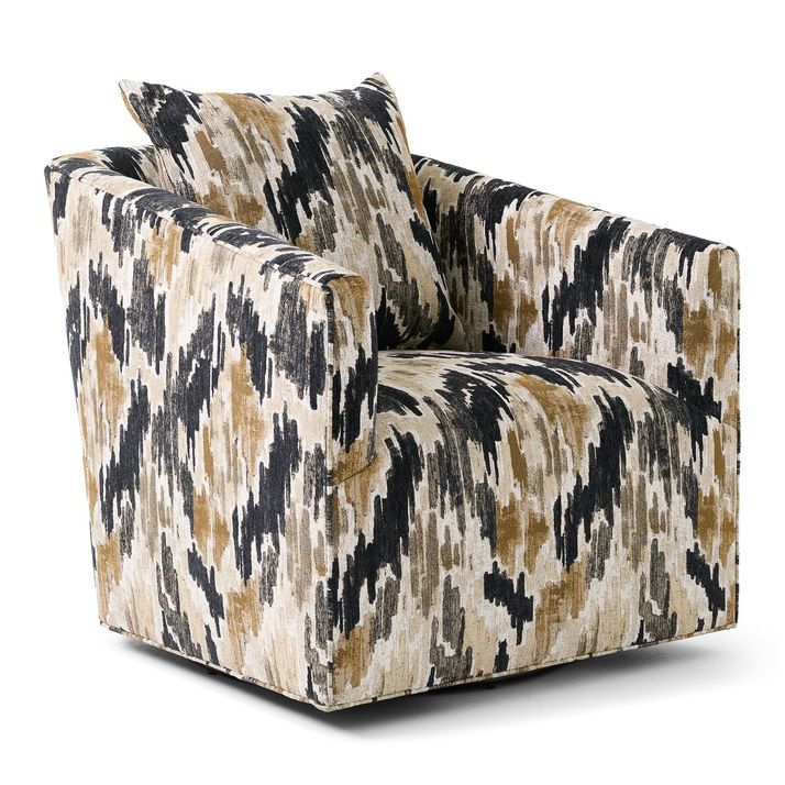 A swivel armchair is shown.   The chair has a low-profile design with substantial armrests. Its upholstery features a patterned fabric in shades of beige, cream, black, and gray. The pattern resembles a modern ethnic or tribal print, with abstract designs and swirling lines.   The chair is positioned facing the viewer, and is isolated against a plain white background.